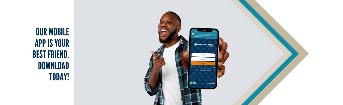 "A cheerful man in a plaid shirt holding a smartphone displaying the Bank & Trust Company mobile app. Text on the left reads 'Our mobile app is your best friend. Download today!'"